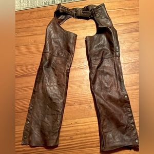 Brown leather motorcycle chaps.